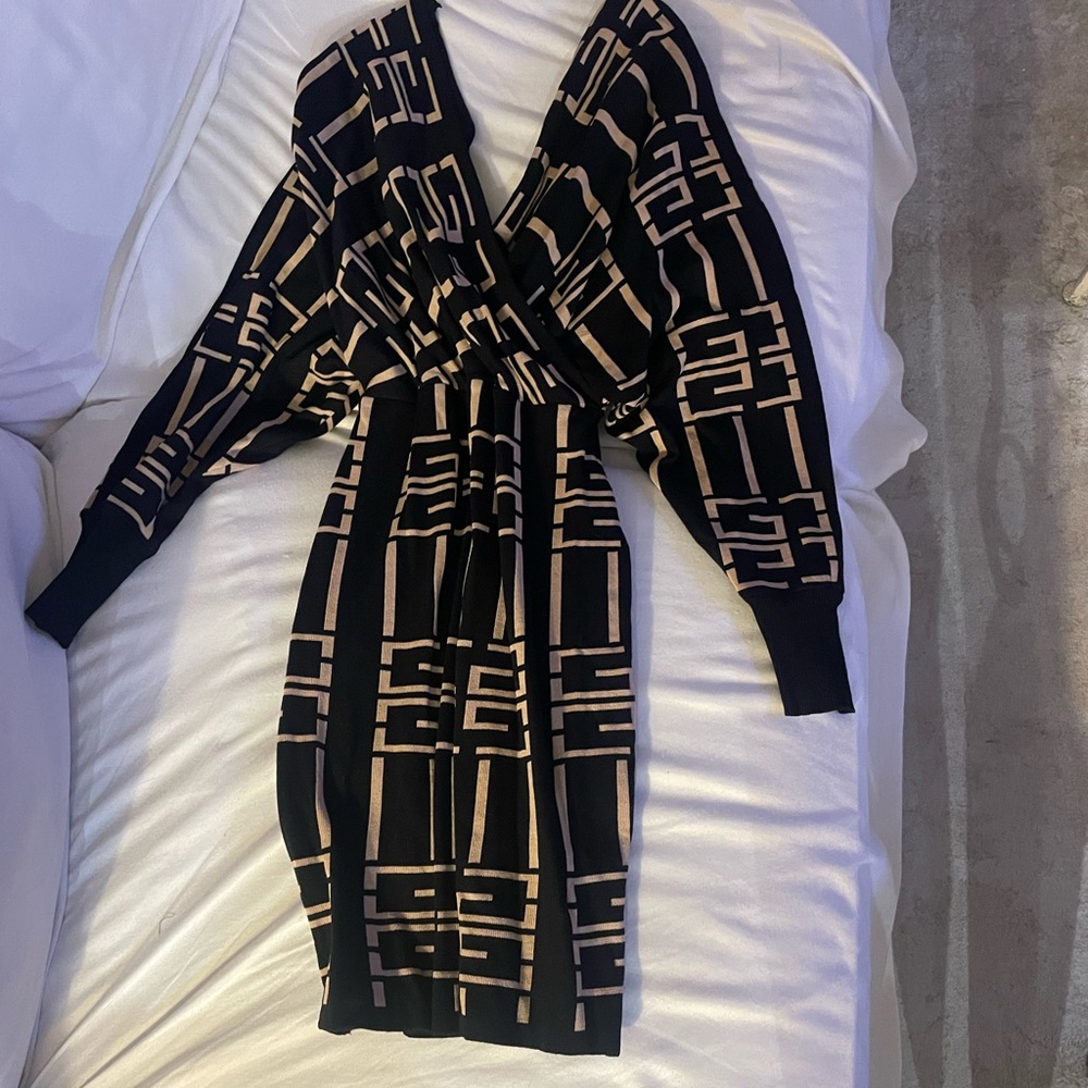 I bought this dress at a boutique and never wore it. It is to big for me